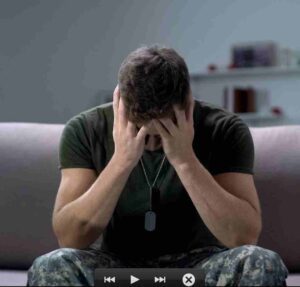 a frustrated man sitting on a couch